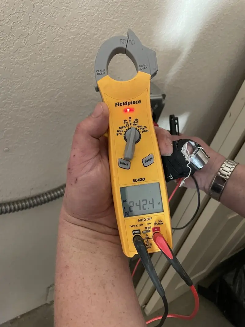 Voltage testing with clamp meter during Ceiling Fan Installation in Mobridge